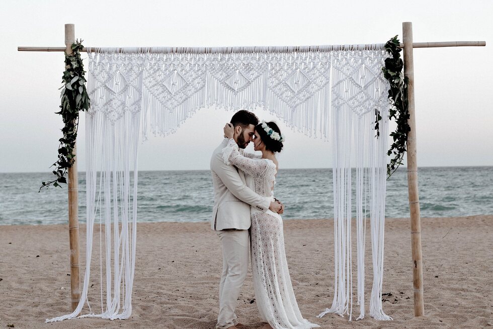 Wedding couple and guests celebrating together